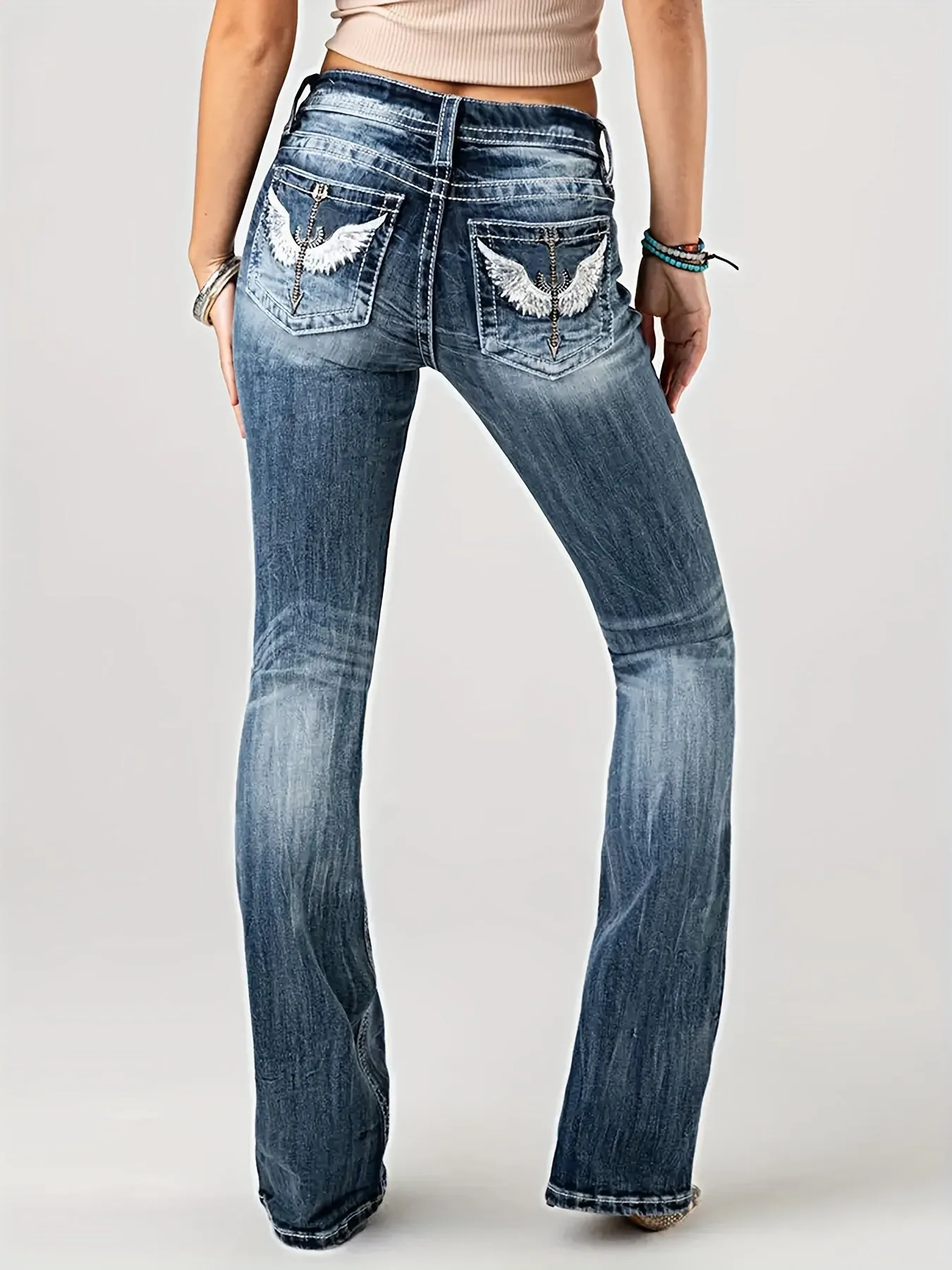 High-Waisted Wing Embroidered Distressed Jeans - Stretchy, Butt-Lifting, Faded, Ripped, Casual Denim Pants for Women - Comfortable, Fashionable, and Versatile Clothing