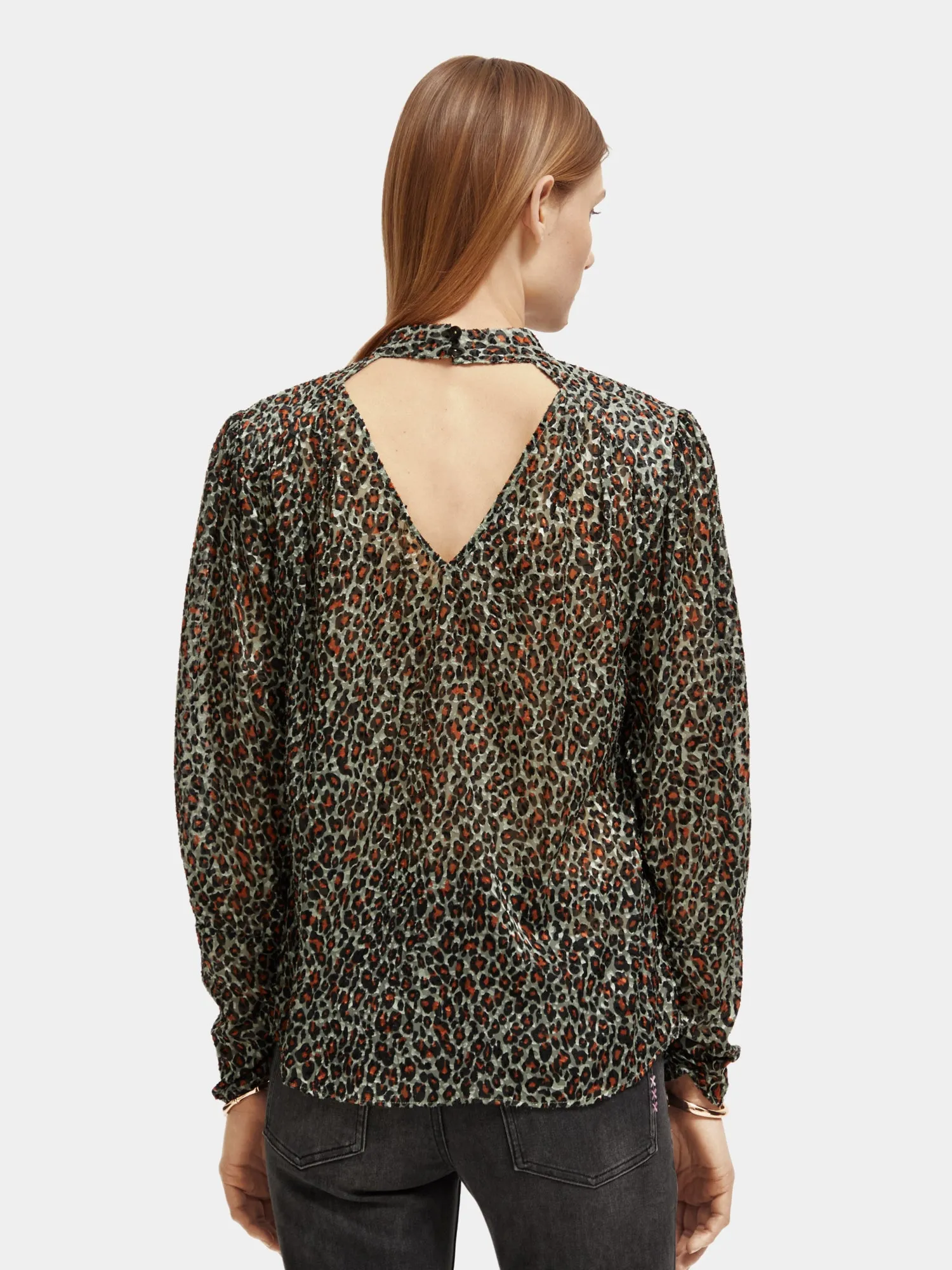 Mock neck open back blouse