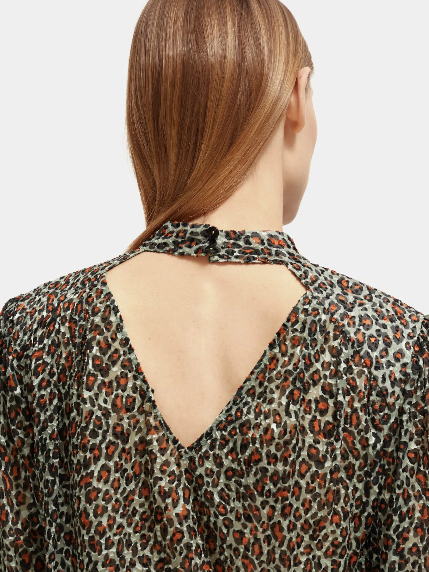 Mock neck open back blouse